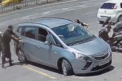 Biri sürücüyü oyaladı diğer ikisi araçtaki çantayı çaldı