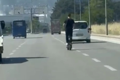 Bursa'da elektrikli scooter üzerinde tehlikeli yolculuk!