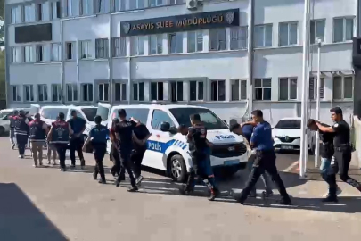 Bursa'da zorla hesap açtırıp kara para aklayan şahıslara baskın!