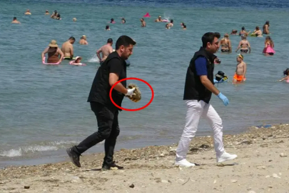 Plajda şoke eden keşif! Yüzerken savaş mühimmatı buldu