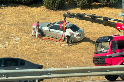 Bursa'da otomobil bariyerleri aşarak tarlaya uçtu